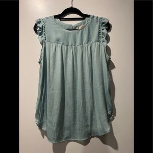 Blouse with ruffle cap sleeve